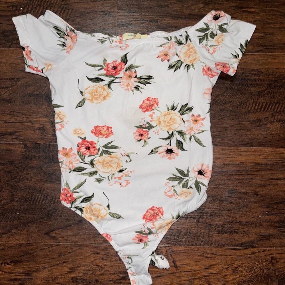 A beautiful flower shirt. It buttons down.